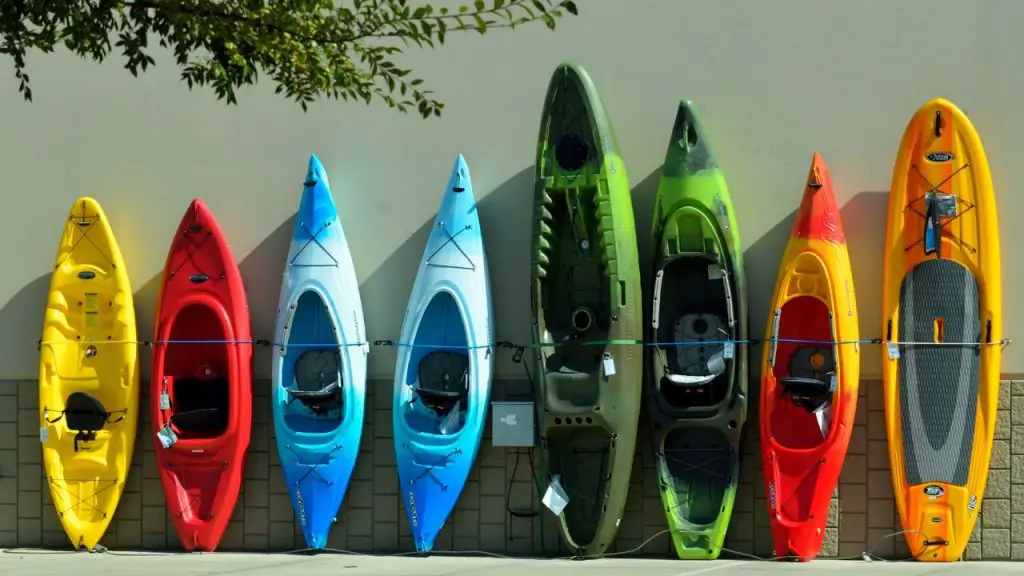 Different types of kayaks being erected
