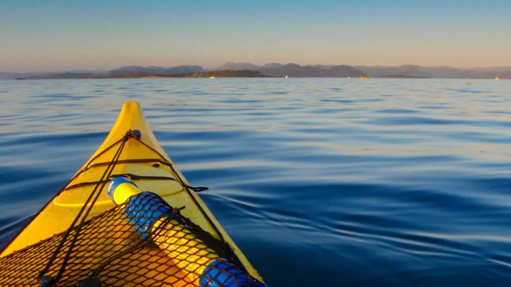 Kayak boat far from shore