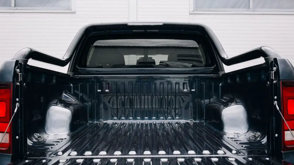 Pickup car with open trunk door