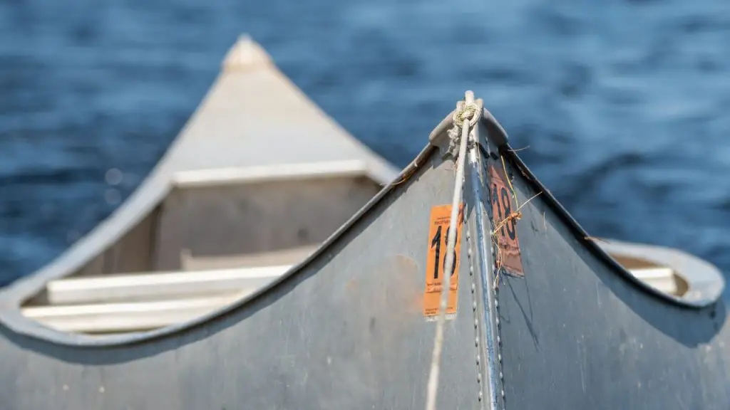 Towing Aluminum Canoe Across Lake