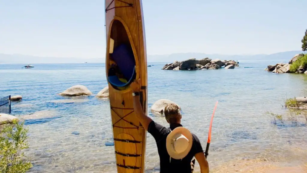 kayaker and kayak on the coast