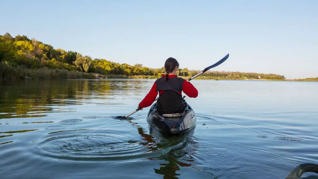 The girl is practicing kayaking