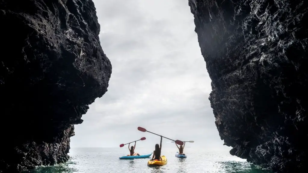 women are kayaking with excitement