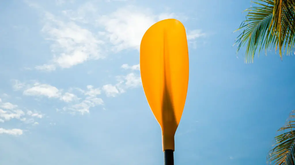 a yellow paddle