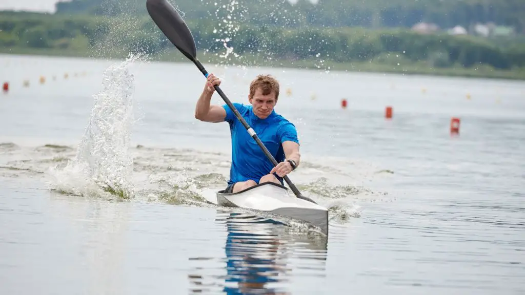 an athlete doing his best in kayaking