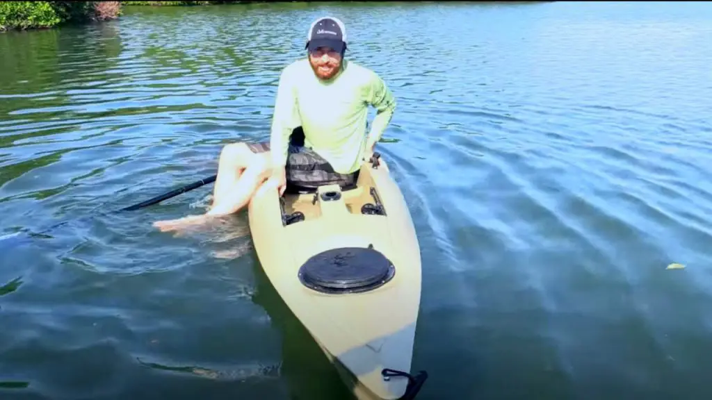 the man is back on the kayak