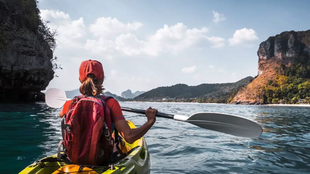 A girl is paddling kayak