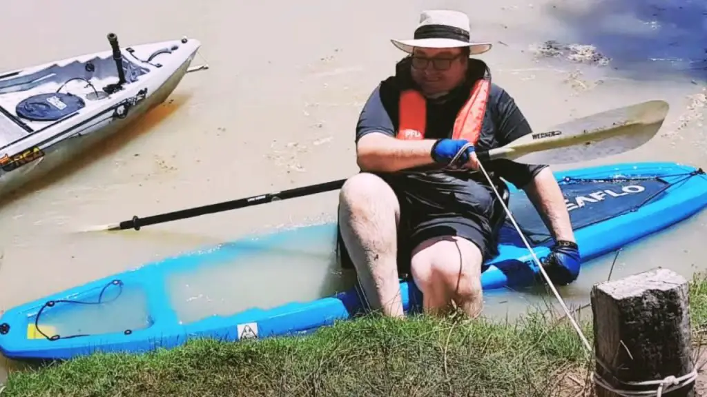 A kayak was overloaded when the man sat on it