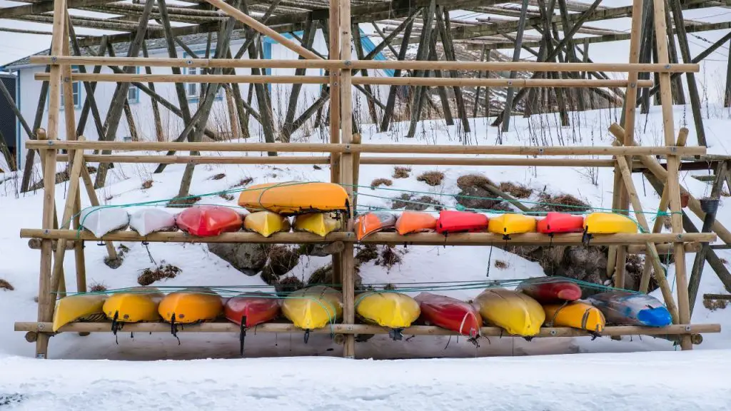 Kayaks are stored outside in the winter