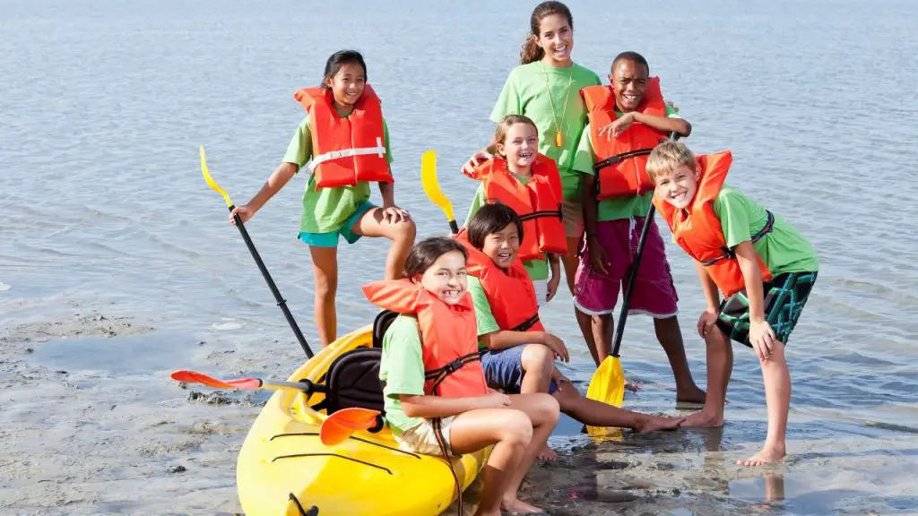 Kayak tour guide with children